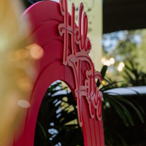 Wavy hot pink backdrop bridal shower set ups